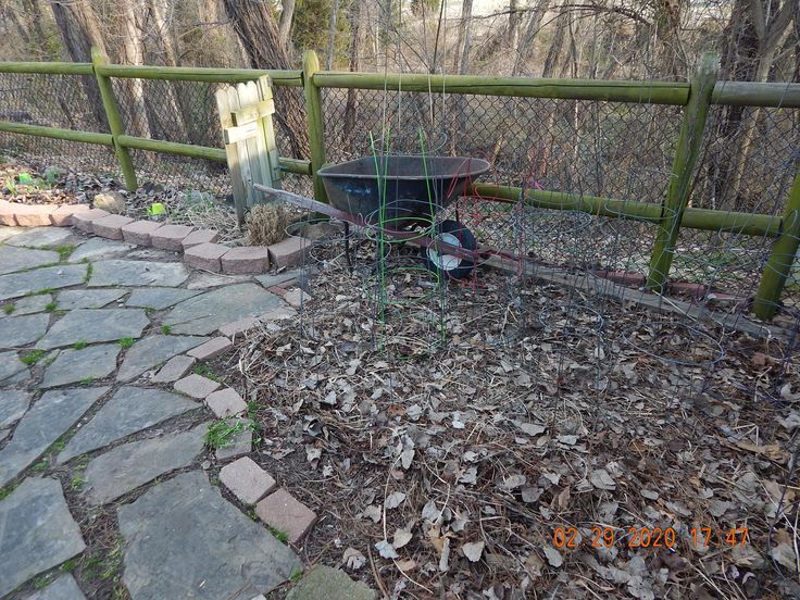 DIY Tipped Wheelbarrow Planter - The Honeycomb Home DIY Tipped Wheelbarrow Planter - The Honeycomb Home