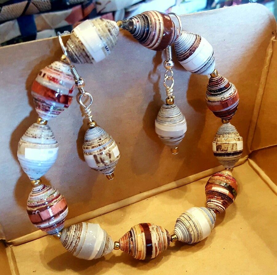 Upcycled magazines, and jewelry along with misc paints, beads ... Upcycled magazines, and jewelry along with misc paints, beads ...